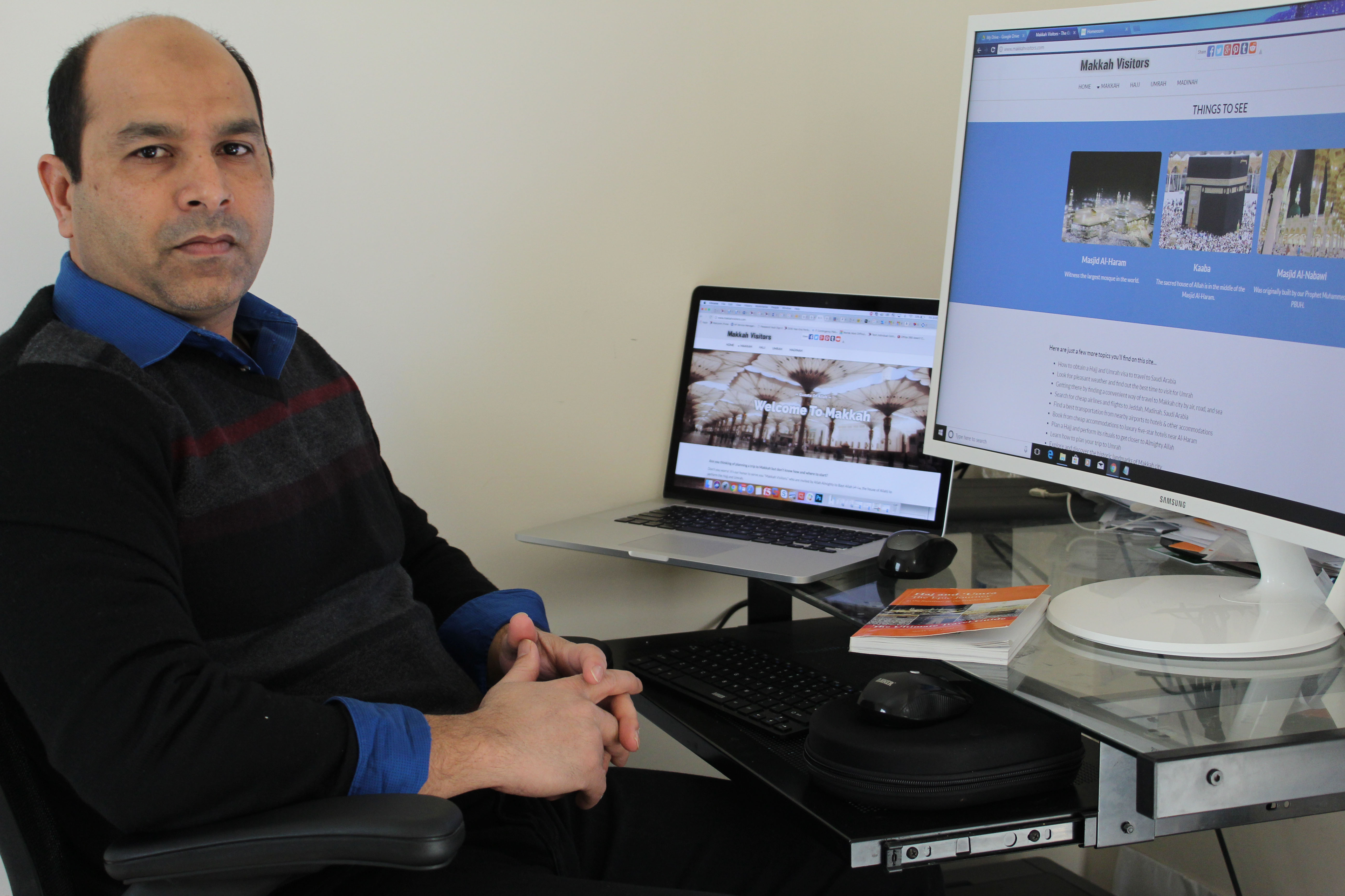 Here, I am sitting in front of computer and working on building MakkahVisitors.com website.